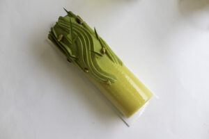 Bûche SIGNATURE <br>Passion Pistache